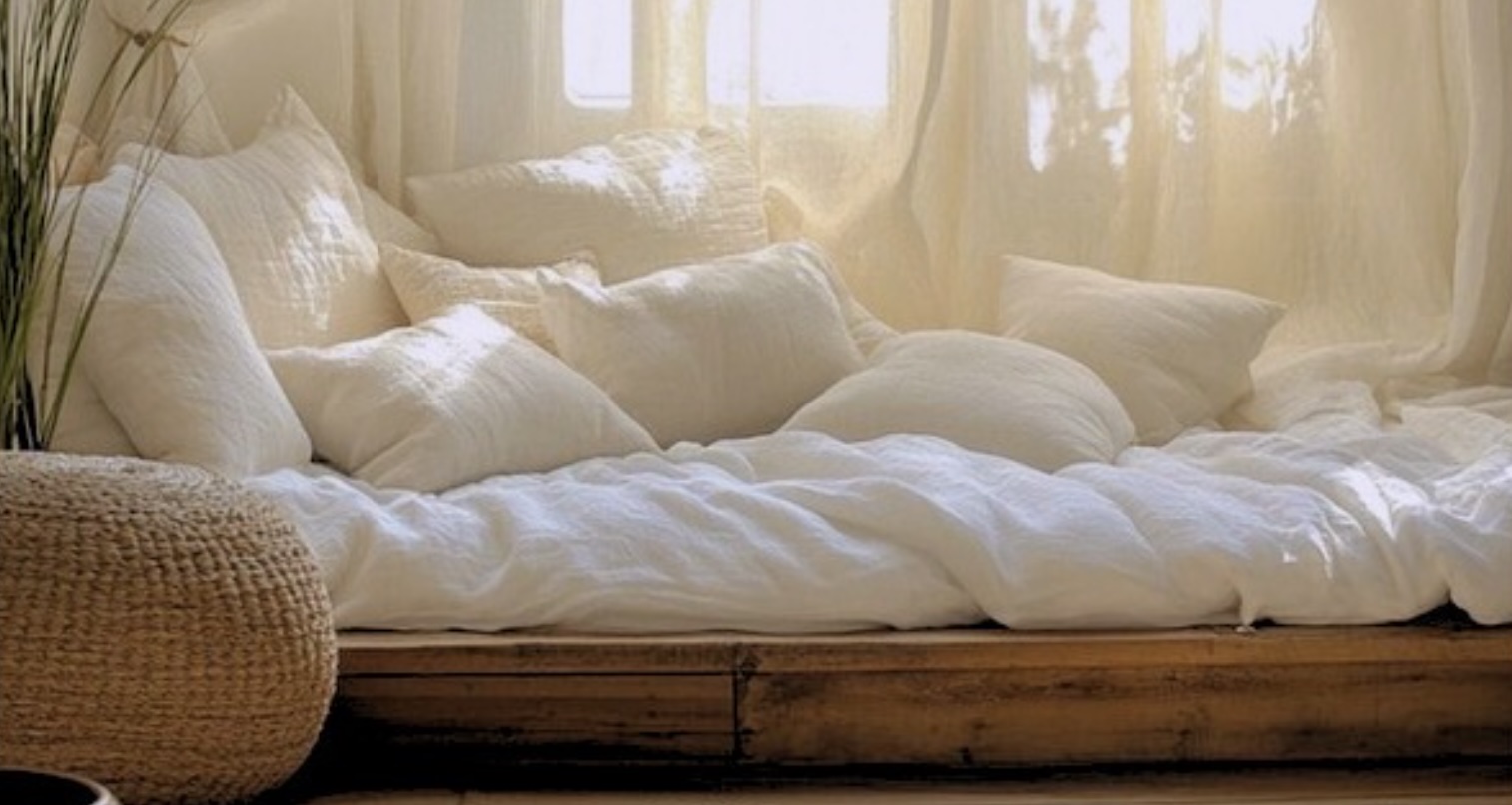 A serene room with white linens - The Gatherings